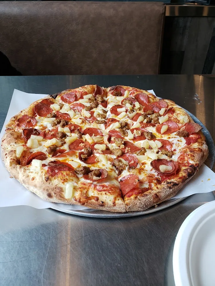 Pepperoni Sausage Pineapple and Roasted Garlic Pizza